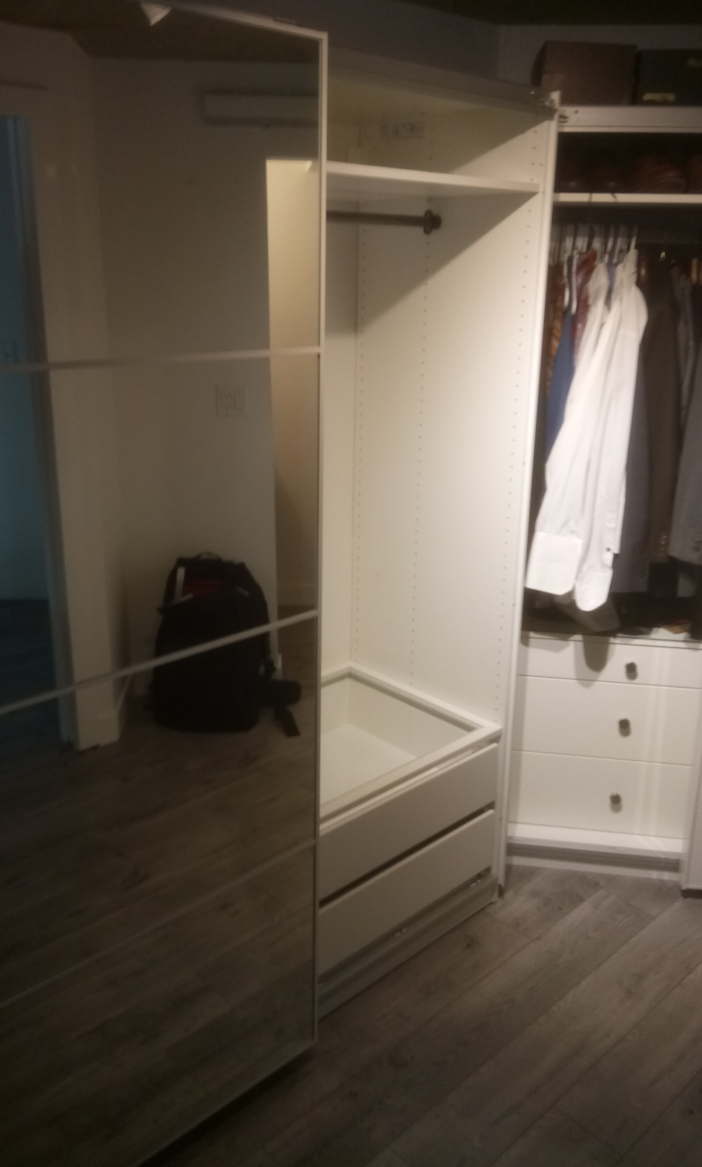 PAX Wardrobe set up mirrored doors