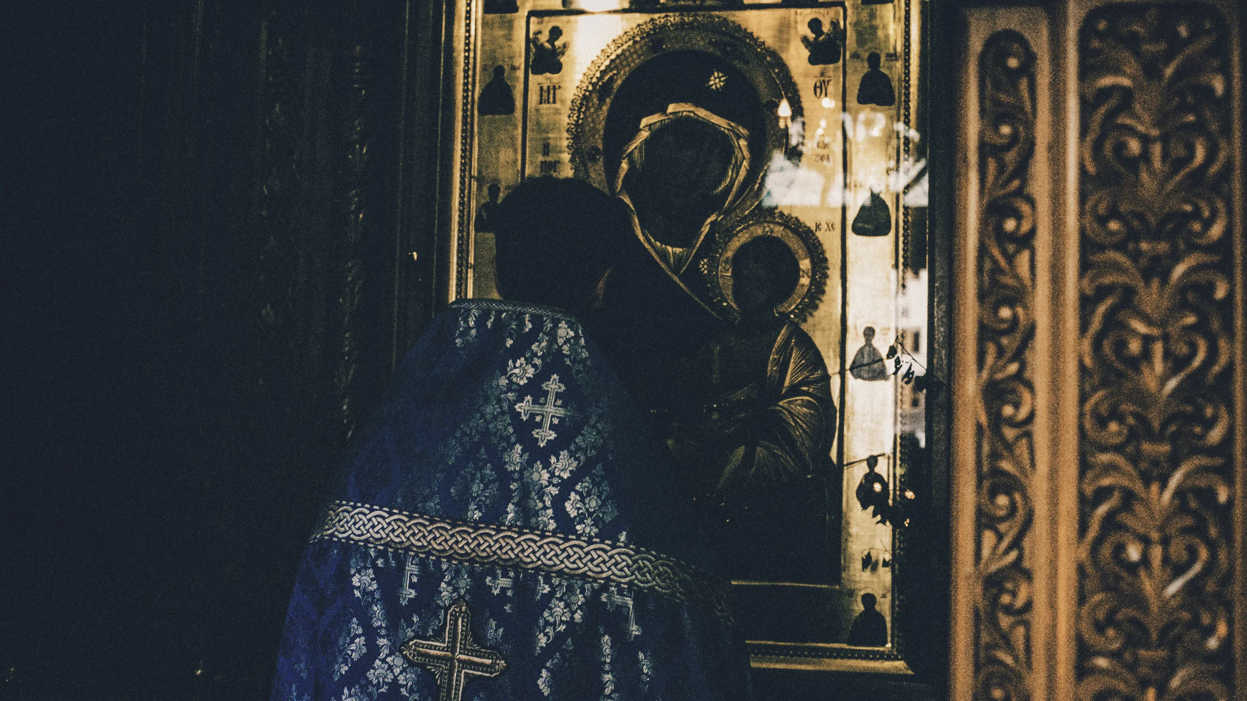 priest praying.jpg