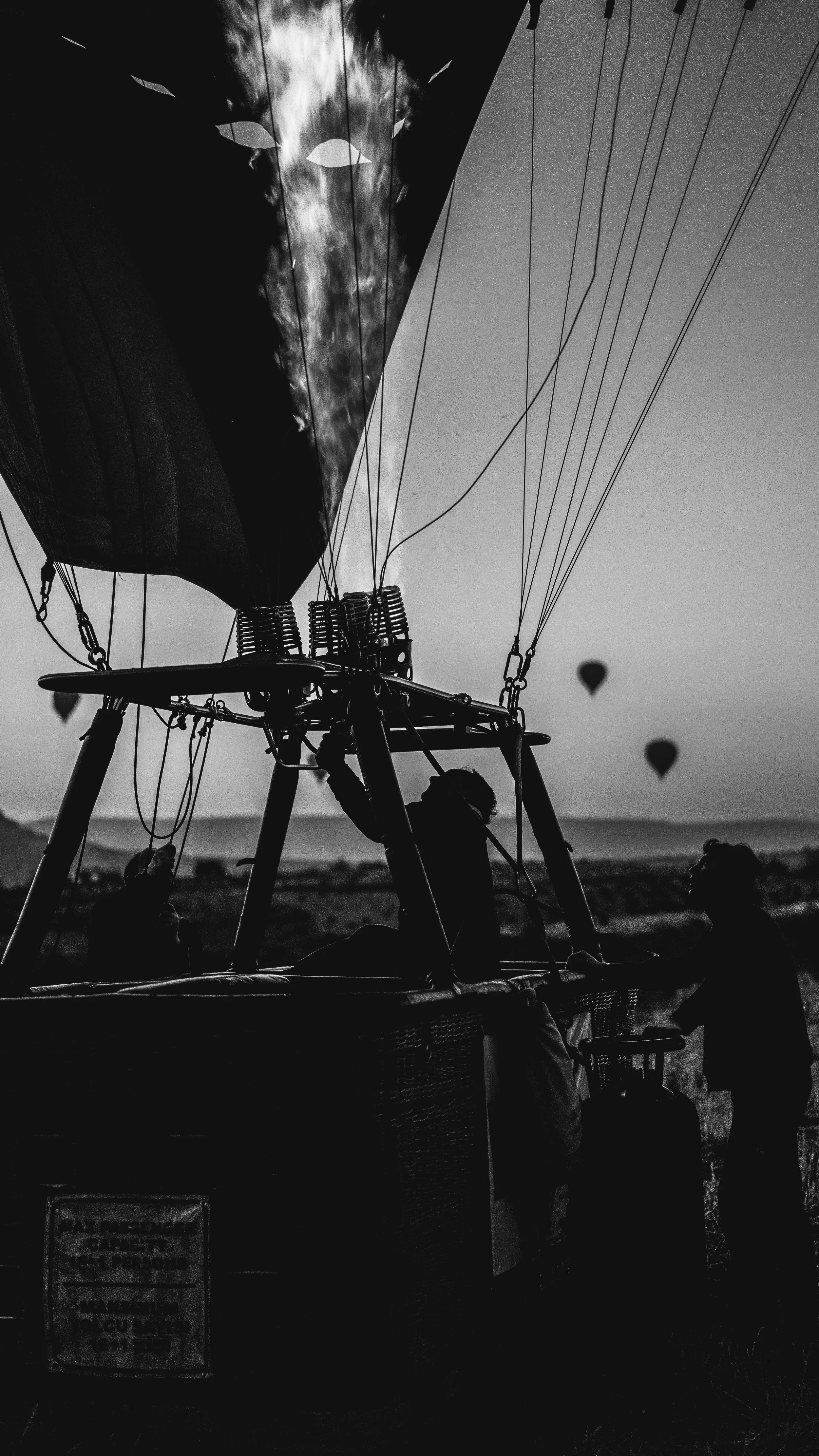 man firing up the balloon.jpg