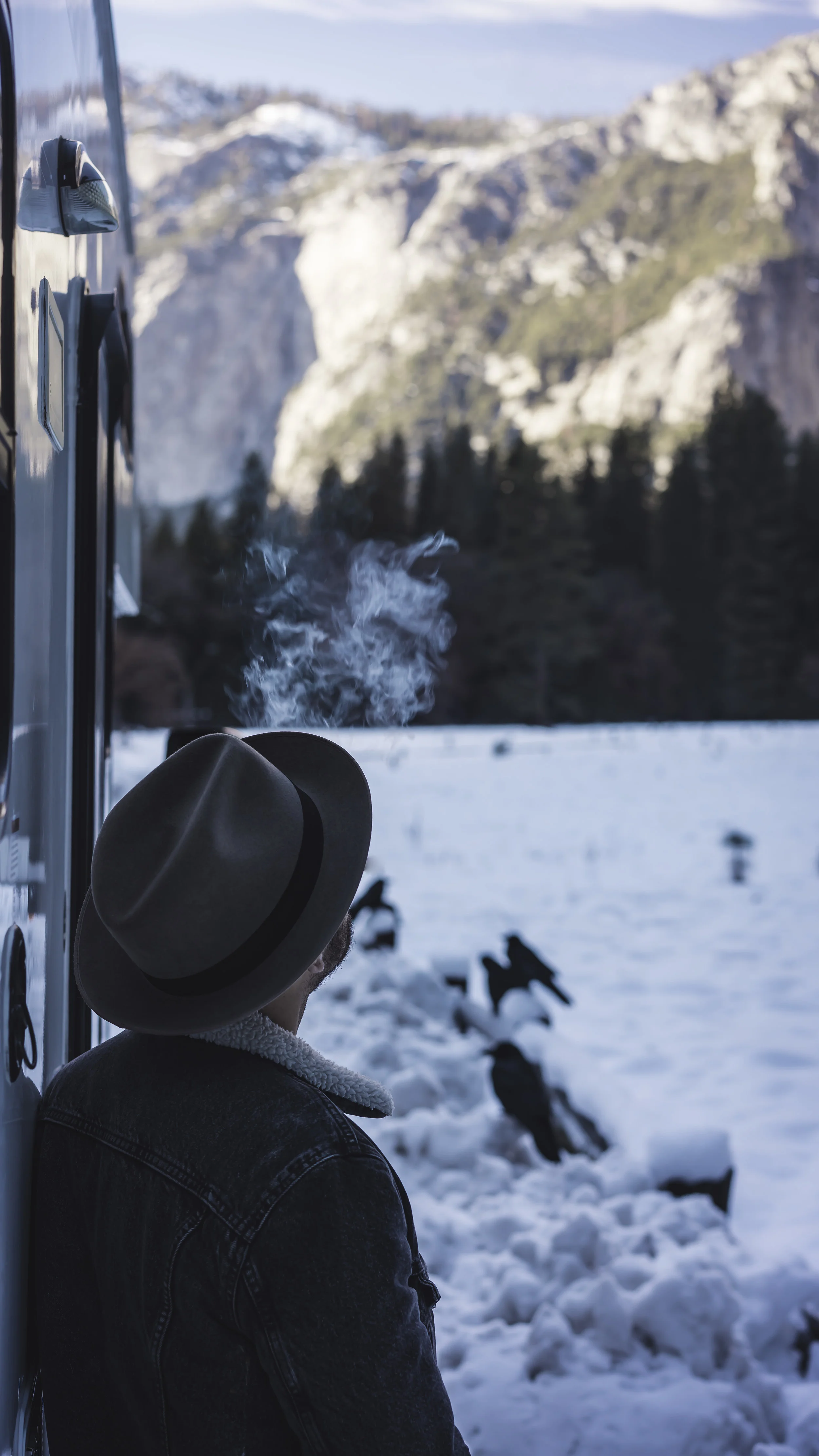 lorenzo leaning on the trailer smoke.jpg