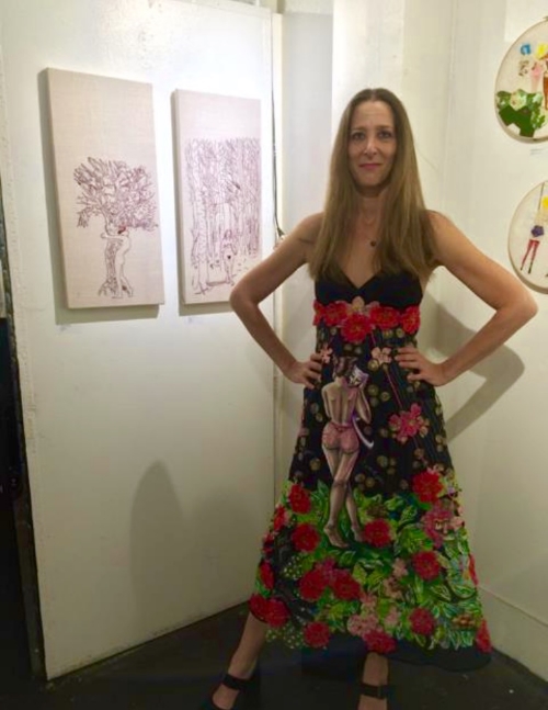 Curator/artist Ellen Schinderman in front of her work at the opening.