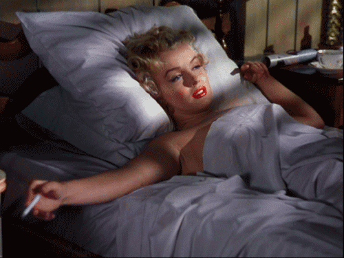 18-marilyn-cigarette-bed.gif