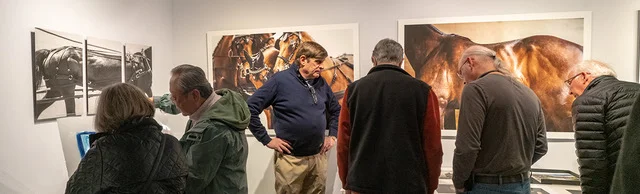 ©Bruce Schlein Coffee folk sharing & viewing the work of others