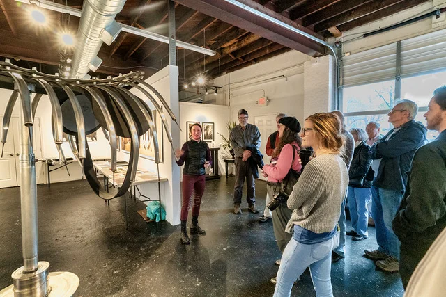 ©Bruce Schlein Monica Stevenson discussing her HORSEscapes exhibition at Saturday Coffee