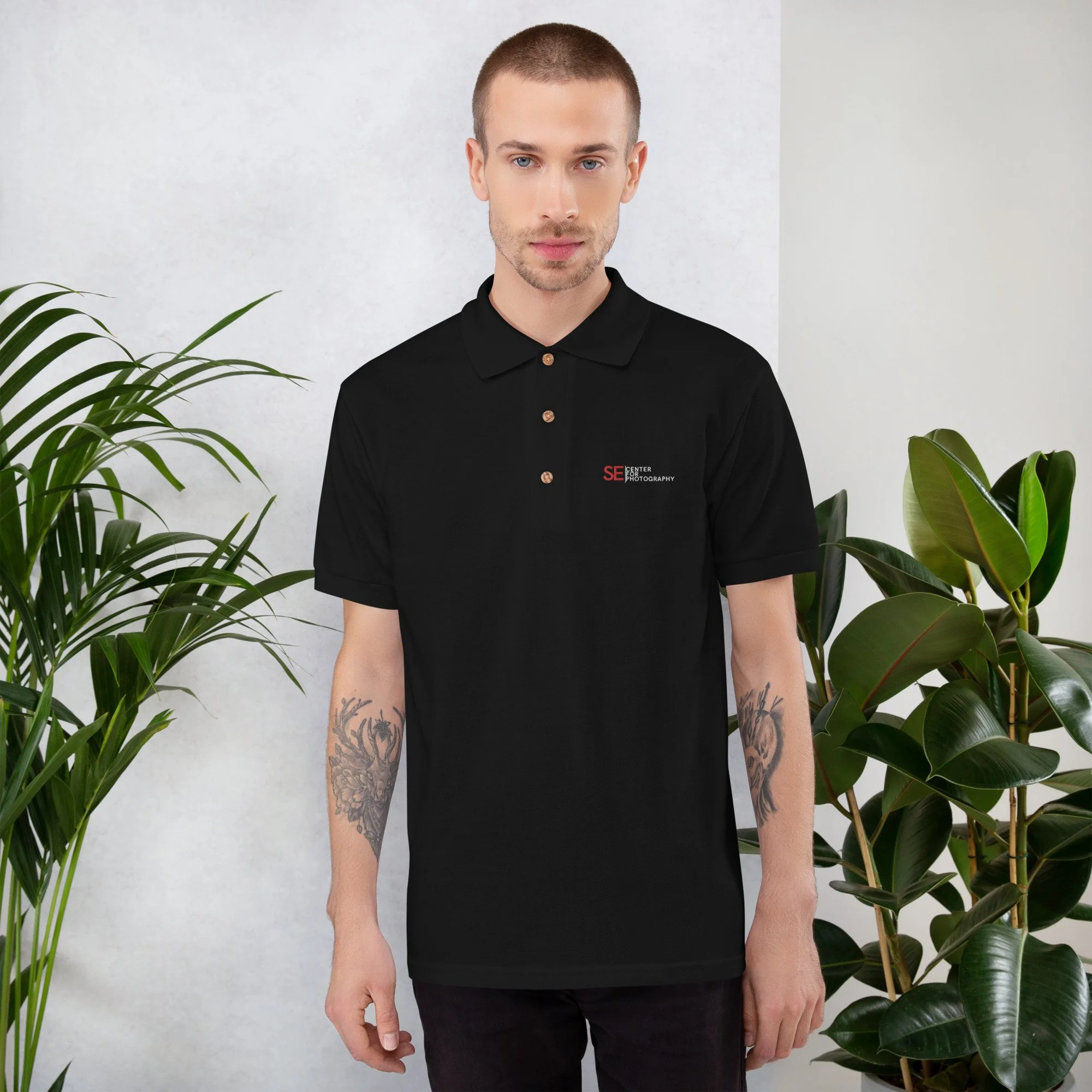 classic-polo-shirt-black-front-632cbbf8b7c16.jpg