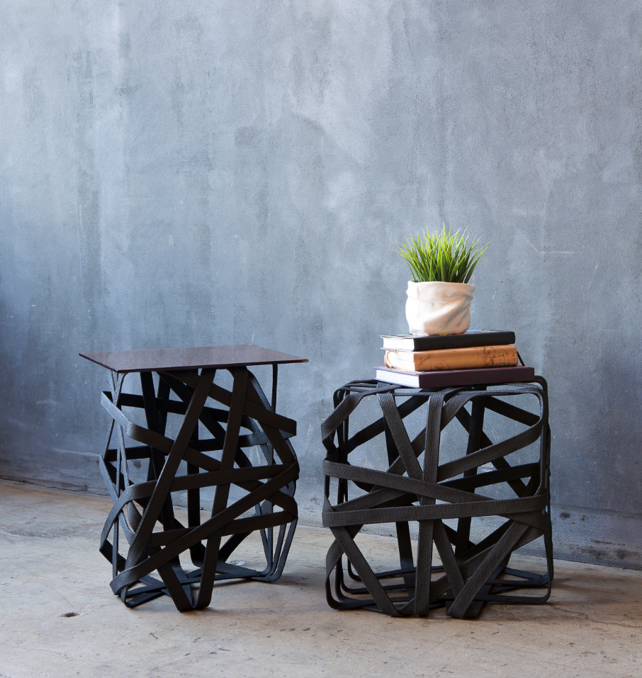 The Woven Cubes fuse an everyday material, strips of natural cloth, with resin, resulting in an illusory cube that appears to magically hold its structure.