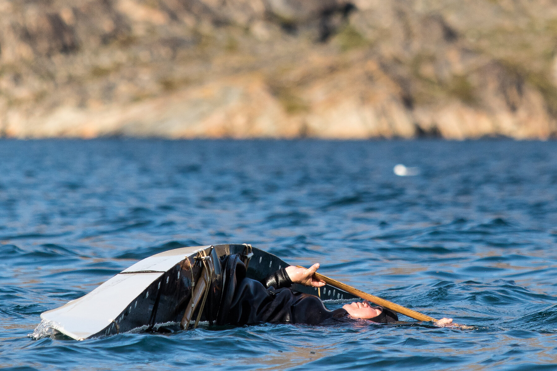  Greenland - Sisimiut- A traditional kayaker pauses momentarily prior to demonstrating the many types of rolls 