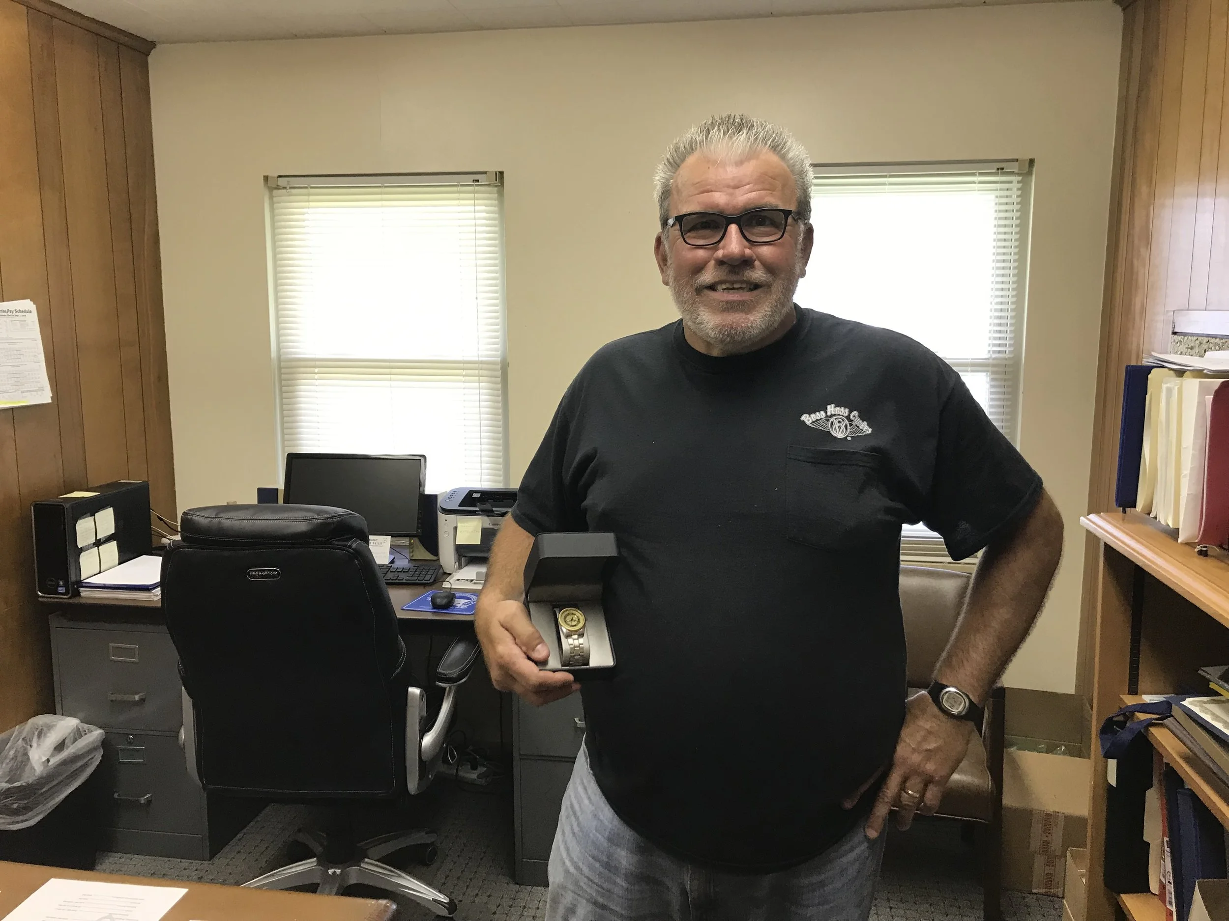 Harry "Pete" Watkins long time Oakland Park Carrier and recent retiree receives his watch on behalf of the union.