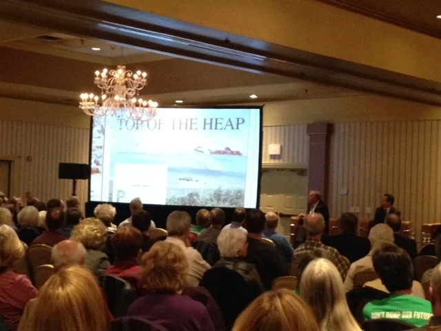 The attendees of FOL's "Let's Talk Trash" public meeting watch a short film prepared for the occasion.