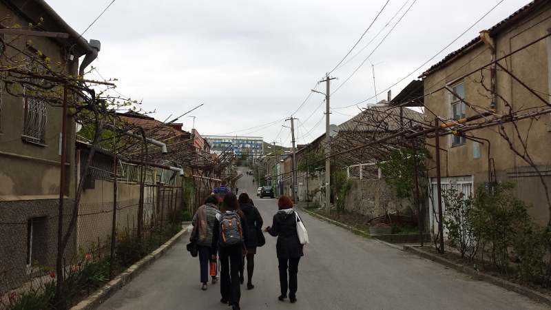 That's my cluster walking to lunch. More importantly, you see those vines crawling up on the sides? Those are grape vines and they grown in front of nearly every home here in Gori. Just about everyone makes their own wine! Can't wait to see them fully verdant.