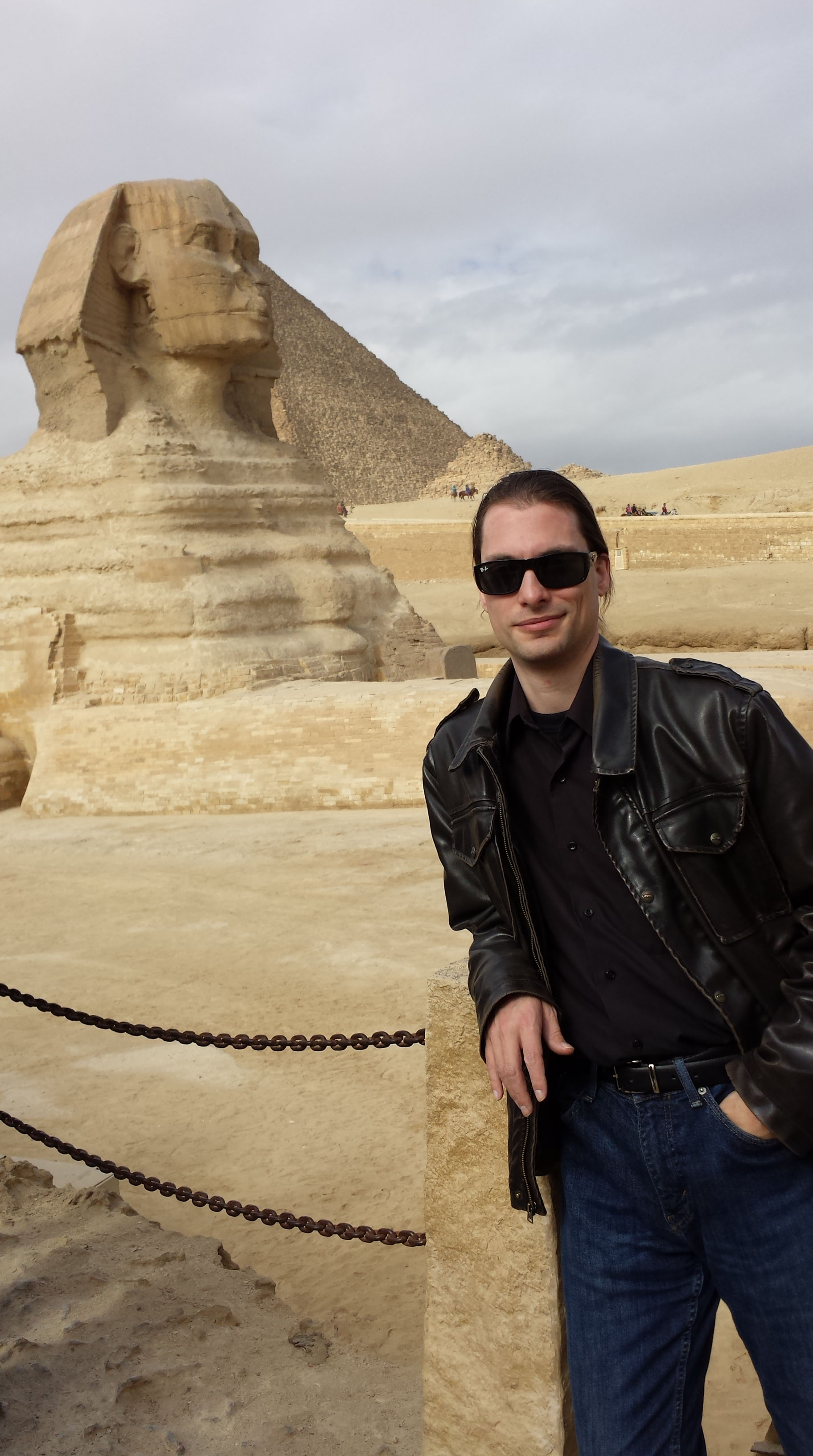 Some smug fool posing with the sphinx.