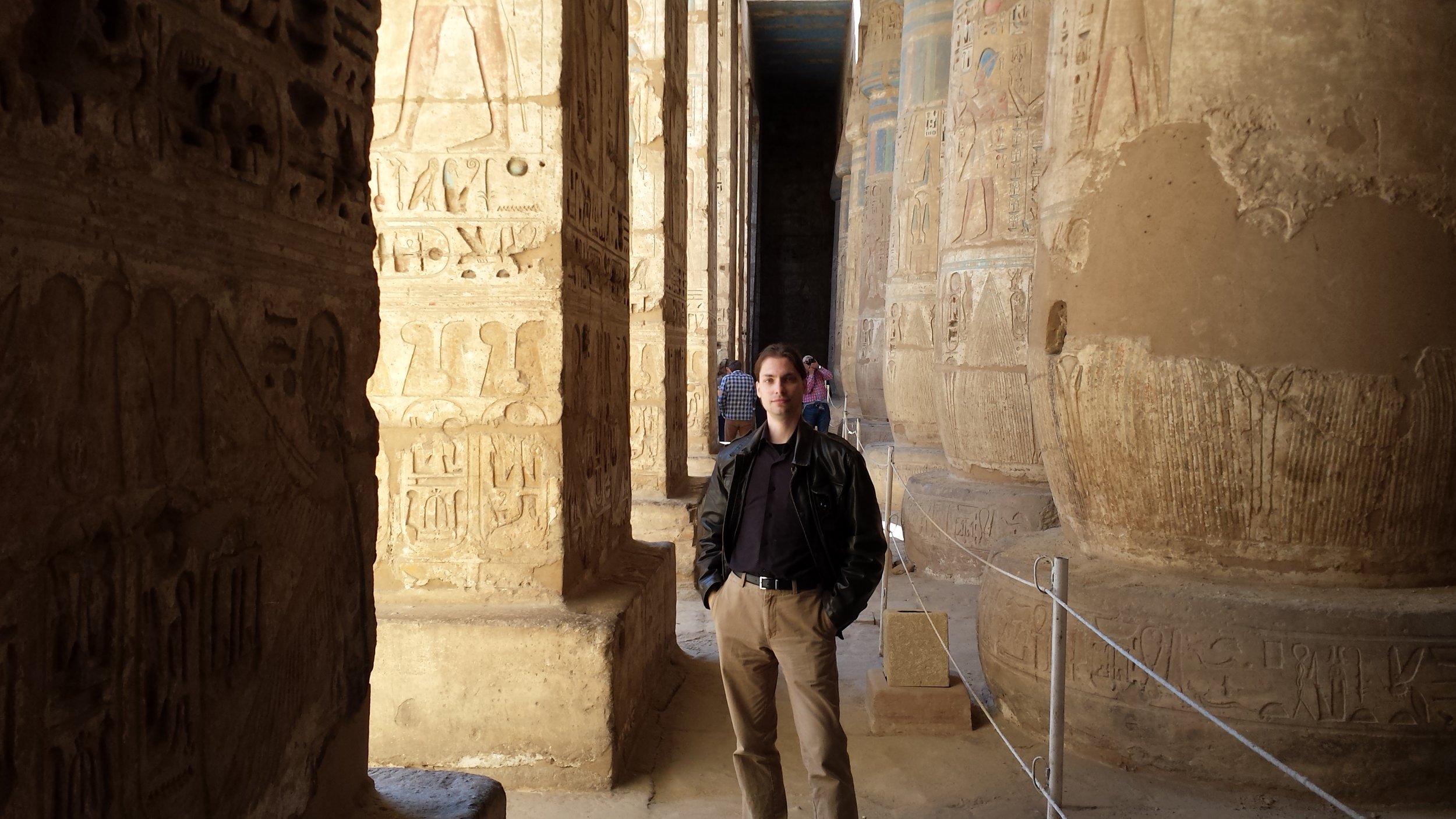 Some fool posing among the columns of the temple. You can still see some color on a few.