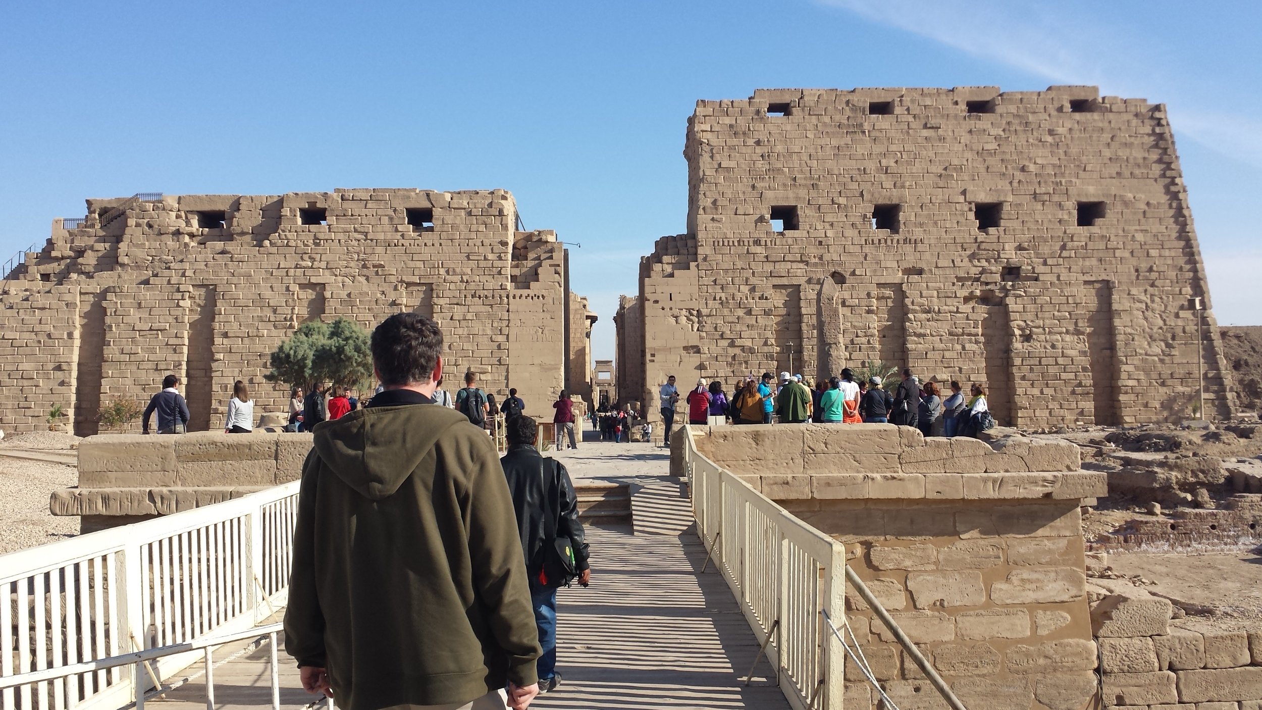 Dan and our guide approaching the entry to the Karnak temple complex and its unfinished pylons.