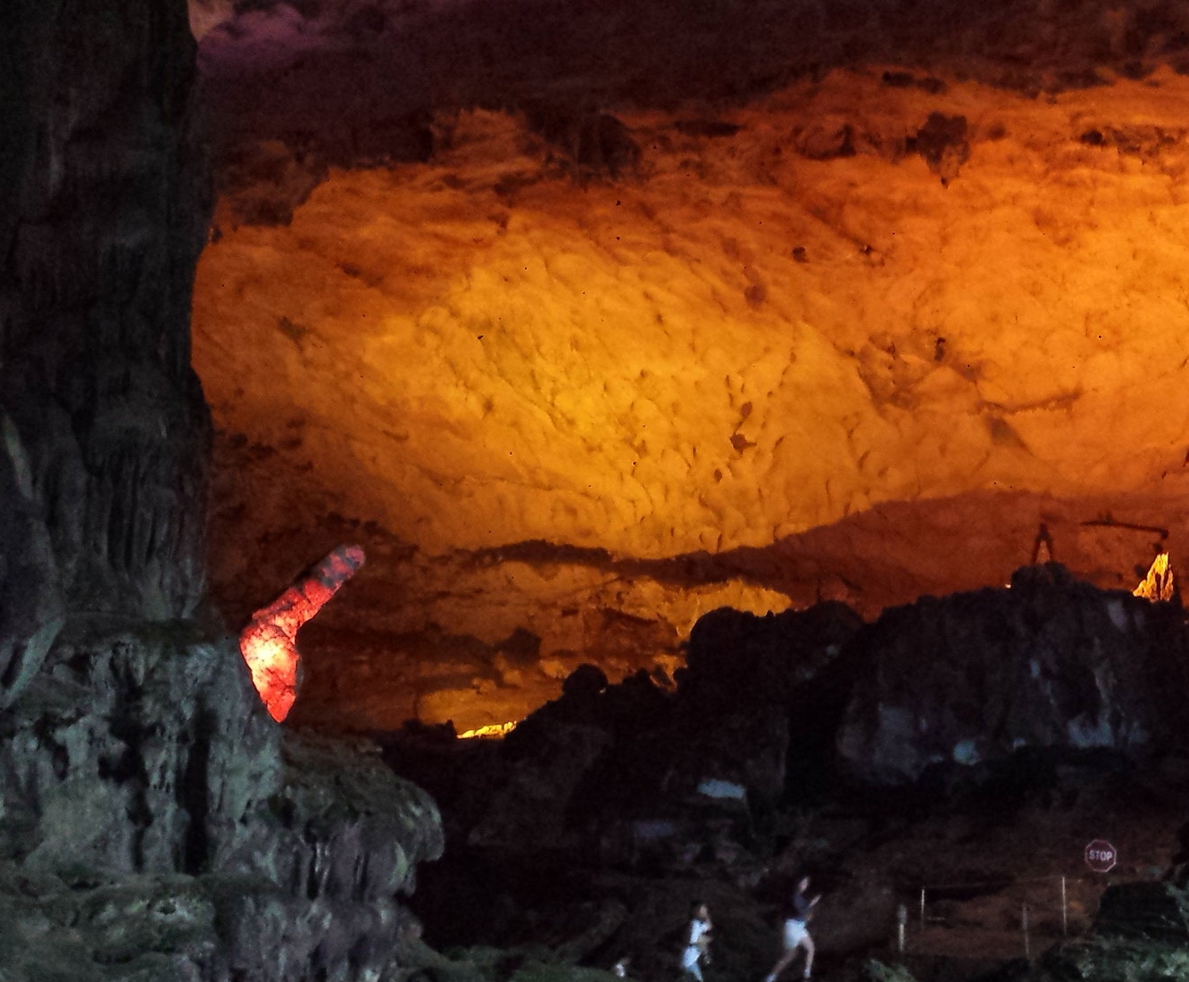 A happy rock pointing to a happy hole.