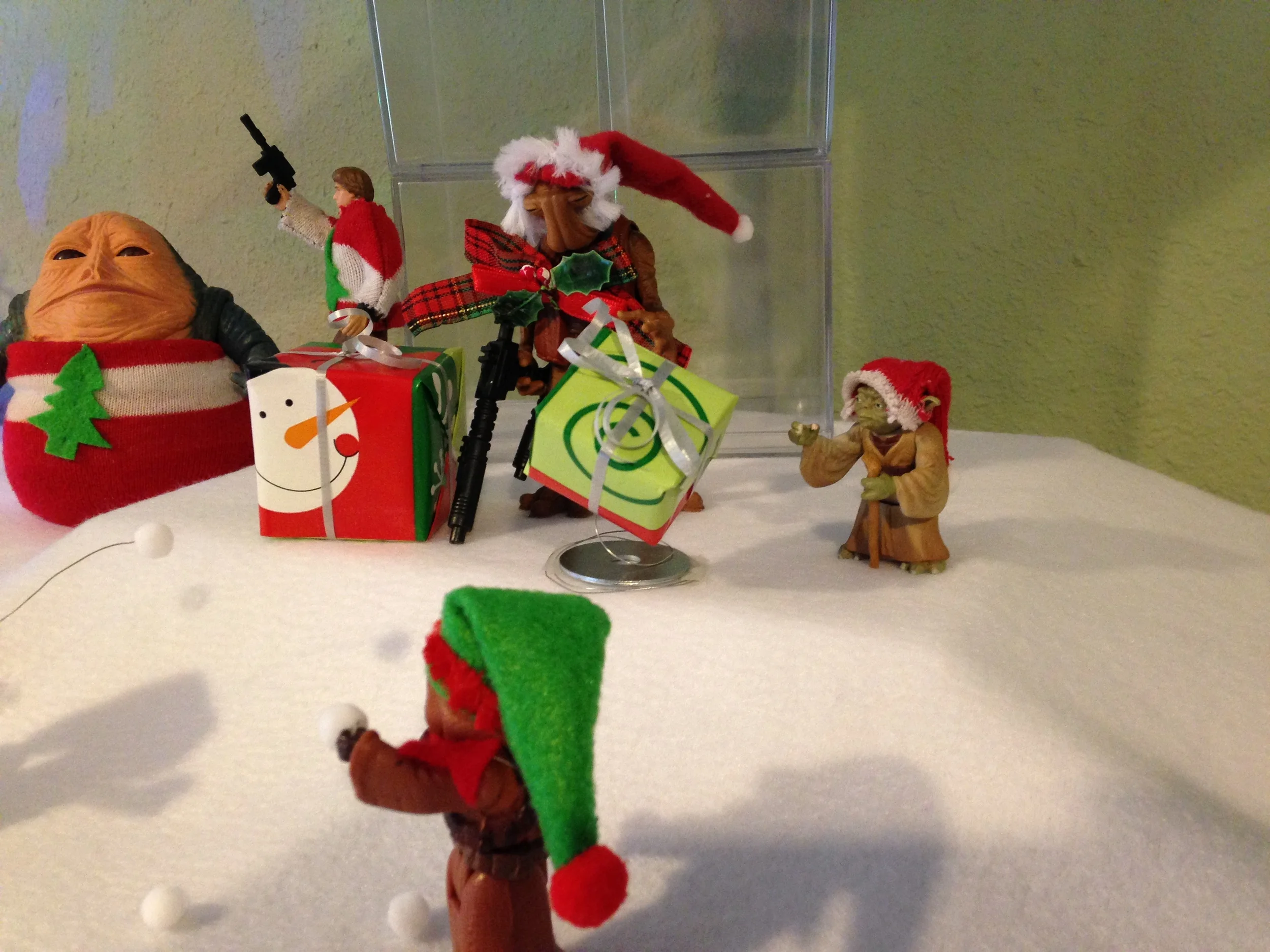 Momaw Nadon and Yoda are exchanging some gifts, with the help of the Force.
