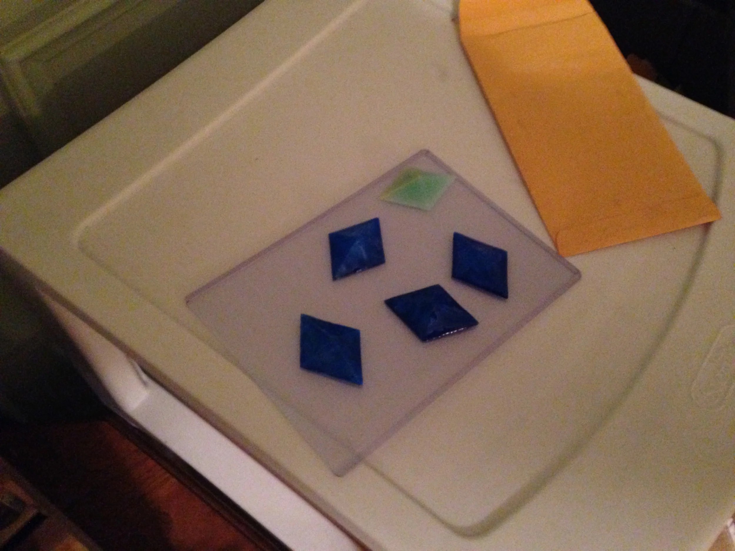 After my many trials and tribulations I finally got gems that are transparent, took on the proper color quite nicely, and don't turn into an amorphous blog of goo after a few hours, huzzah!