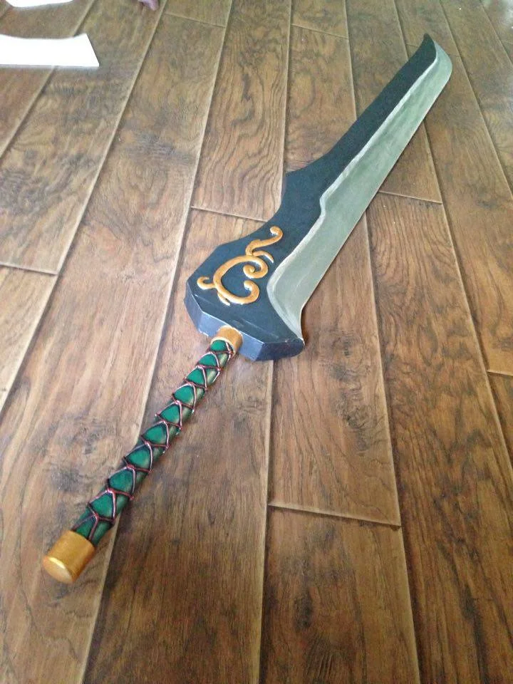 Auron's katana is a great example of a very wide bevel. I would not want to have to sand that whole surface into this shape with just wood. I'd be spending the rest of my life working on it.