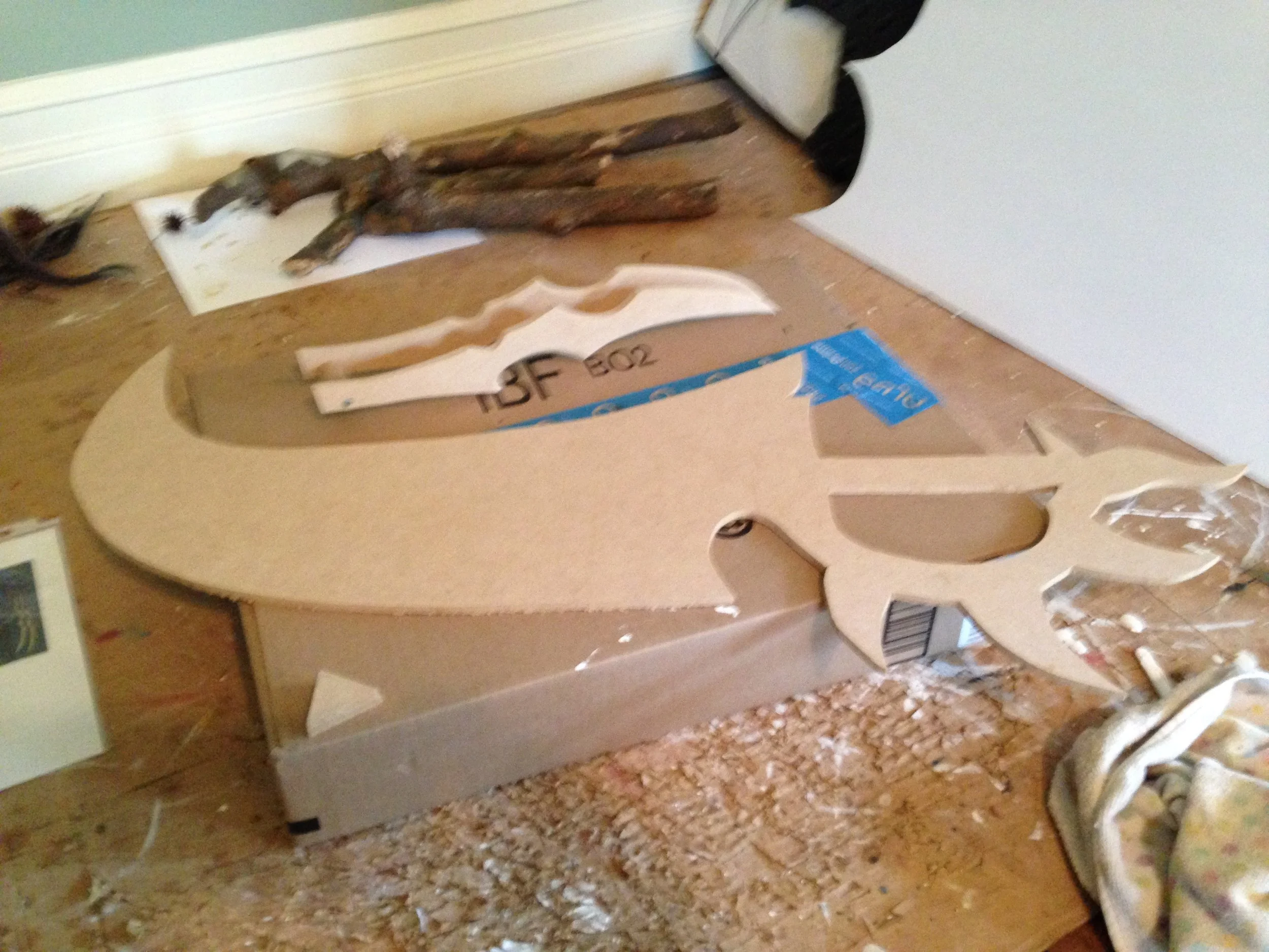 To connect the two small blades, I used a chunk of dowel rod and screwed them on, then wood glued everything to make sure it stayed together.