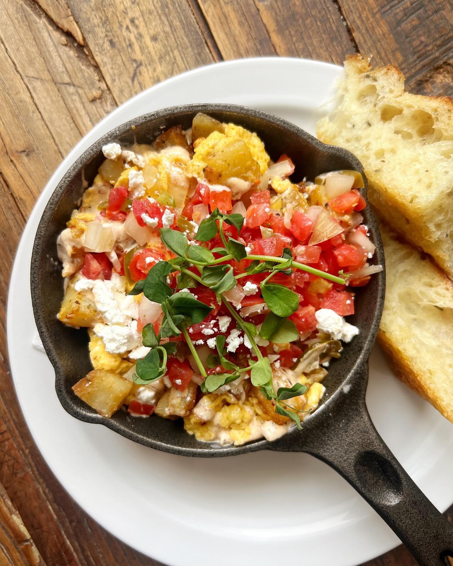 New to the spring menu &bull; Breakfast Skillet 🍳 

Seasoned potatoes with pico de gallo, scrambled eggs, southwest sauce, and feta, served with fresh Focaccia. 

#yegbrunch #yegeats #breakfastlover #brunchtime