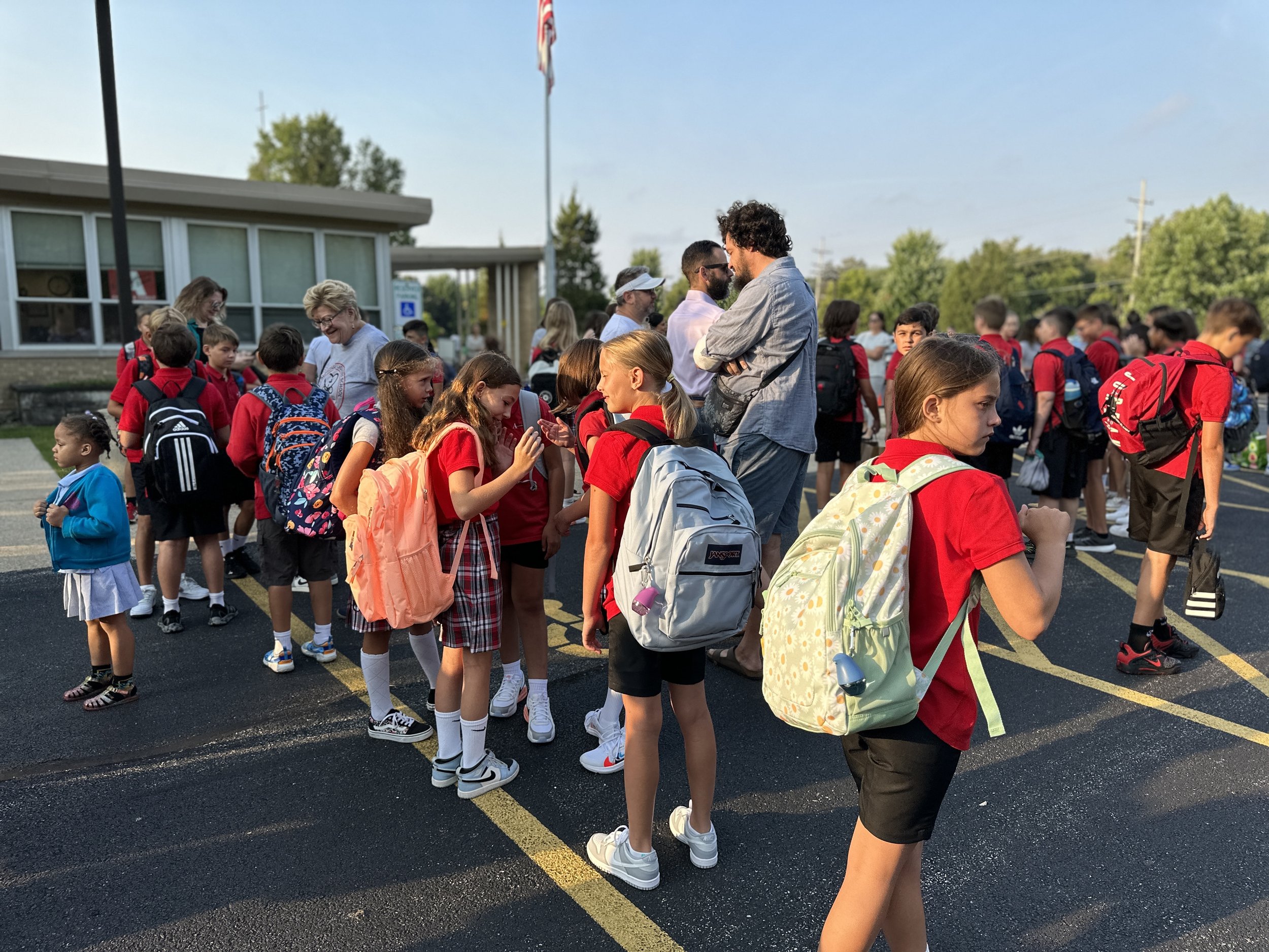  Students are lining up with their classes on the first day of school 