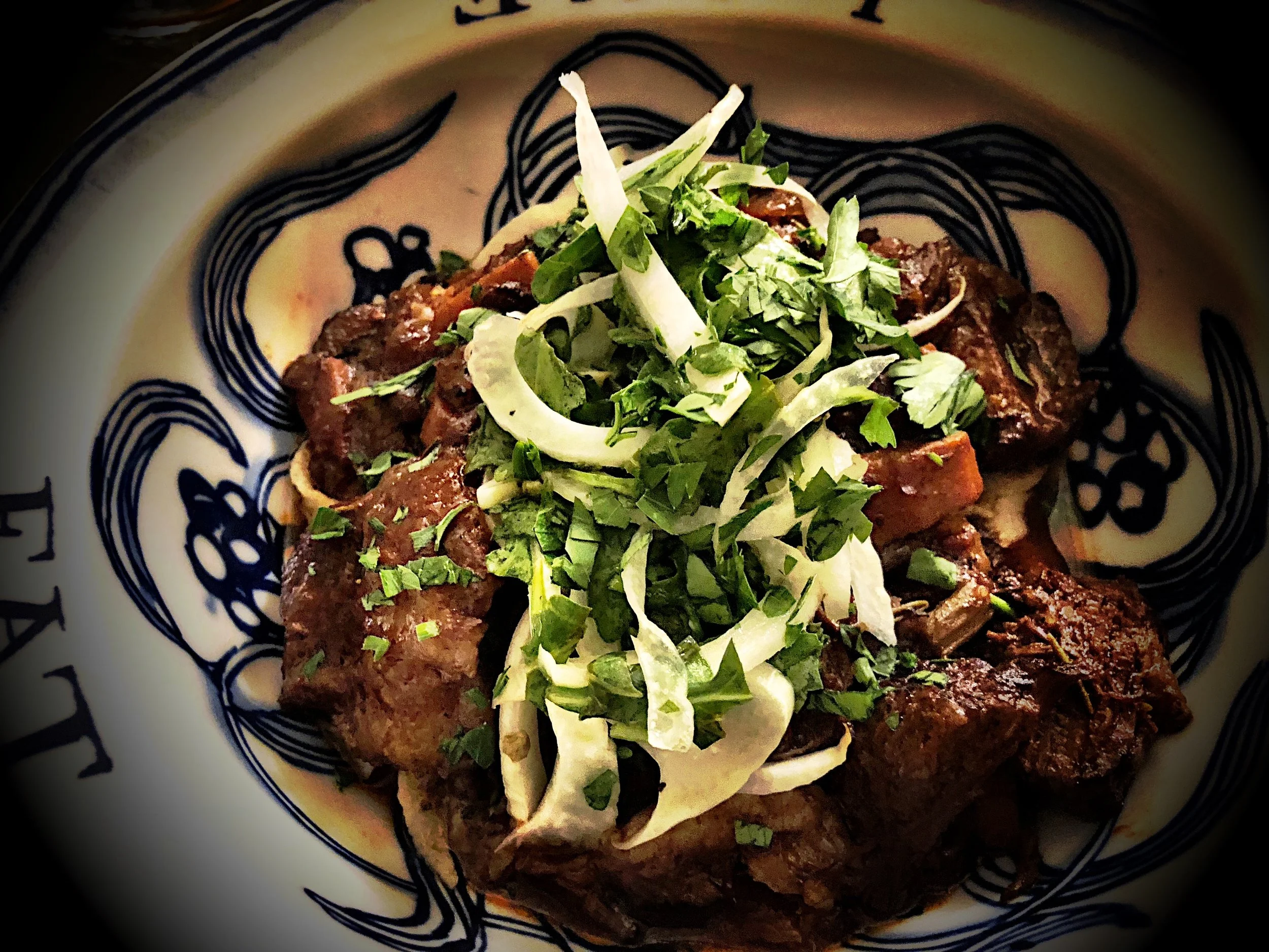 Hatch Red Chile Short Ribs with a Fennel and Arugula garnish