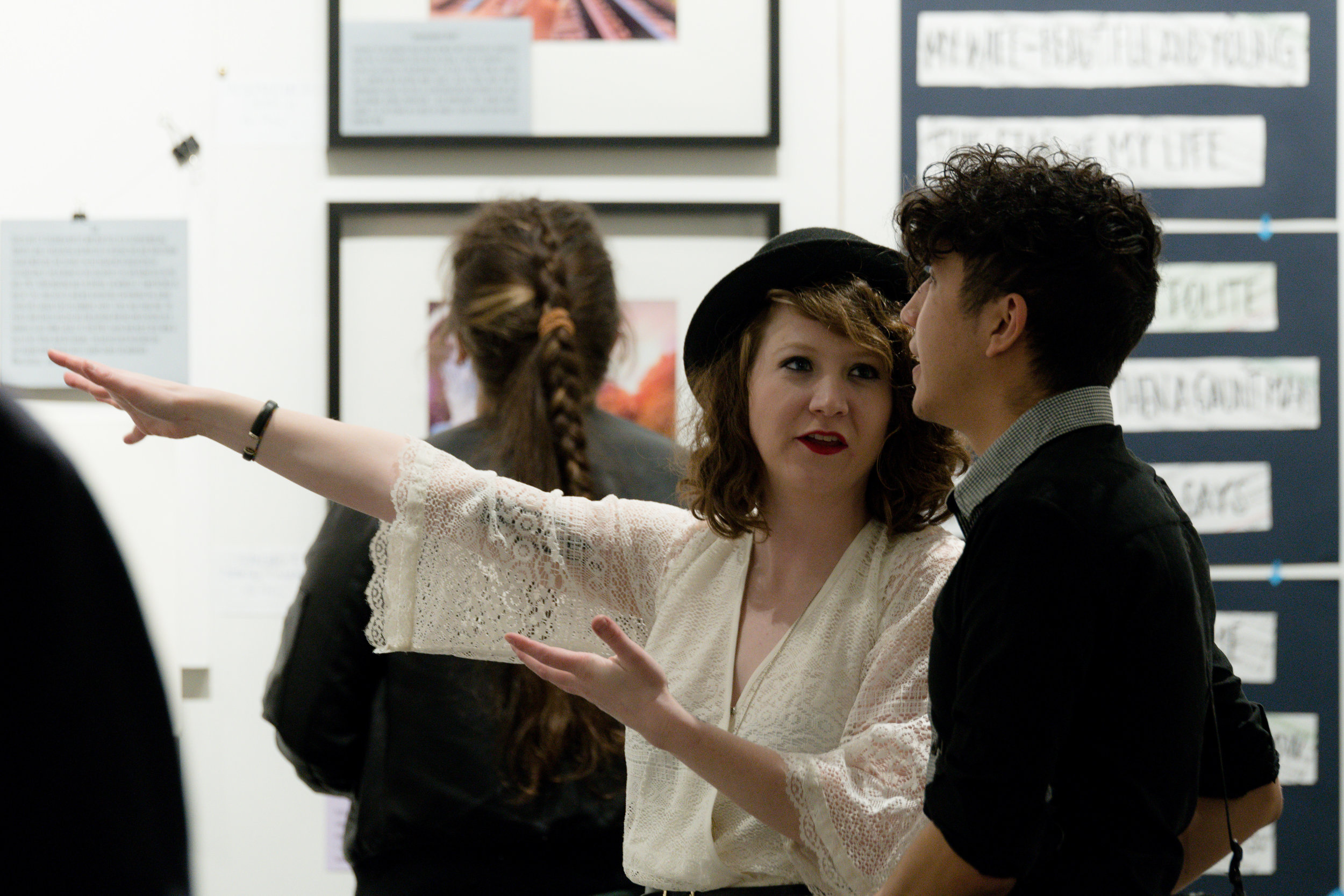 Here I am using fake confidence to tell an artist that I've kind of screwed something up in his exhibit. He's taking the news really well.