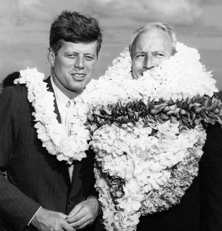 JFK and Hawai'i Governor John Burns with all his lei. In Hawai'ian language the word lei refers to one lei or many lei!