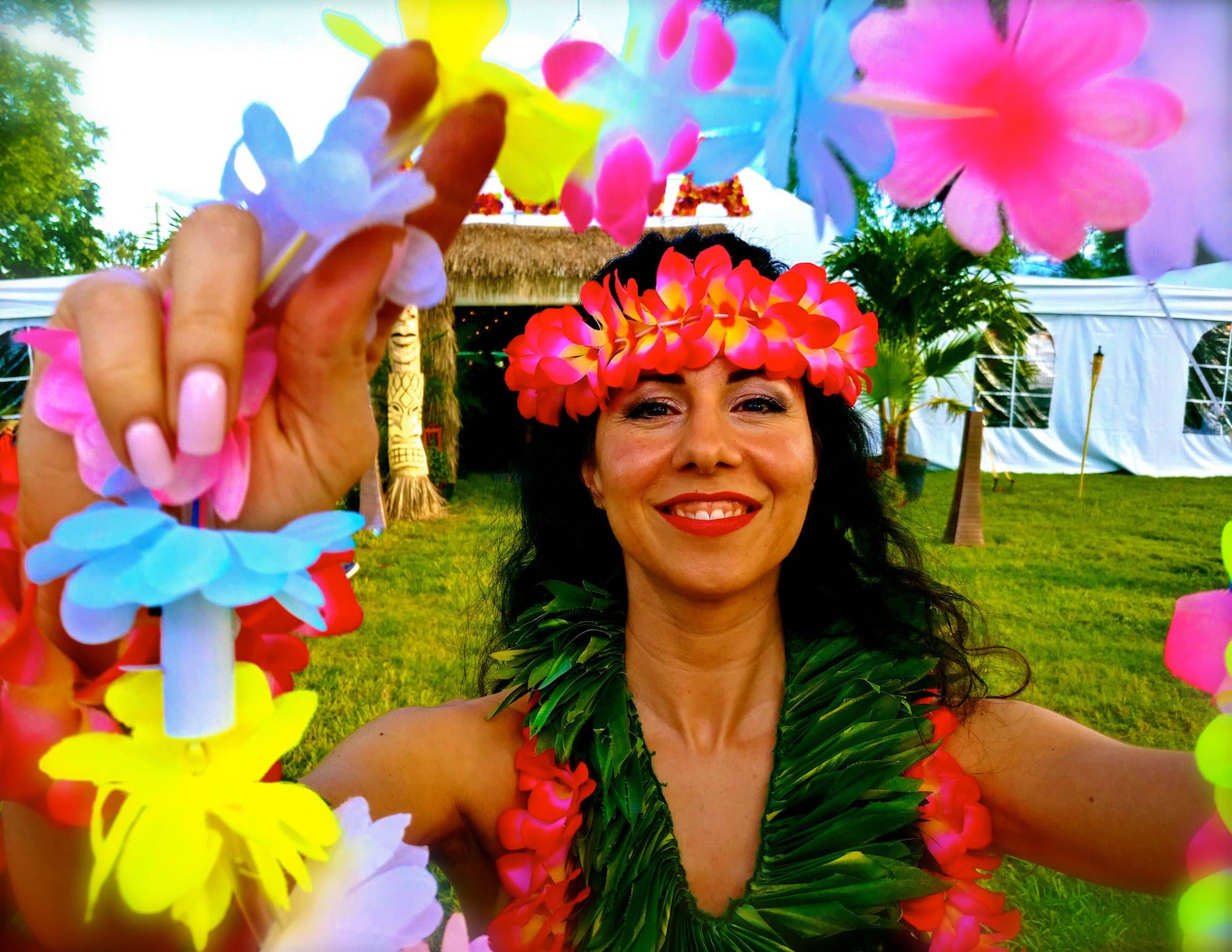 Hawaiian Dancer greeting a guest at Toronto party.jpg