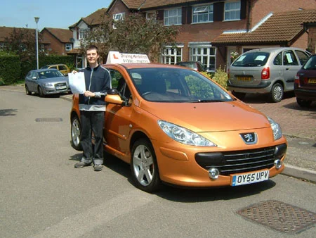 Sam Yates by car2.jpg
