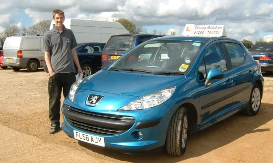 Nathan Sheehan by car.jpg