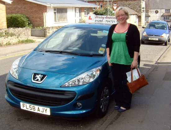 Susie Harper by car.jpg