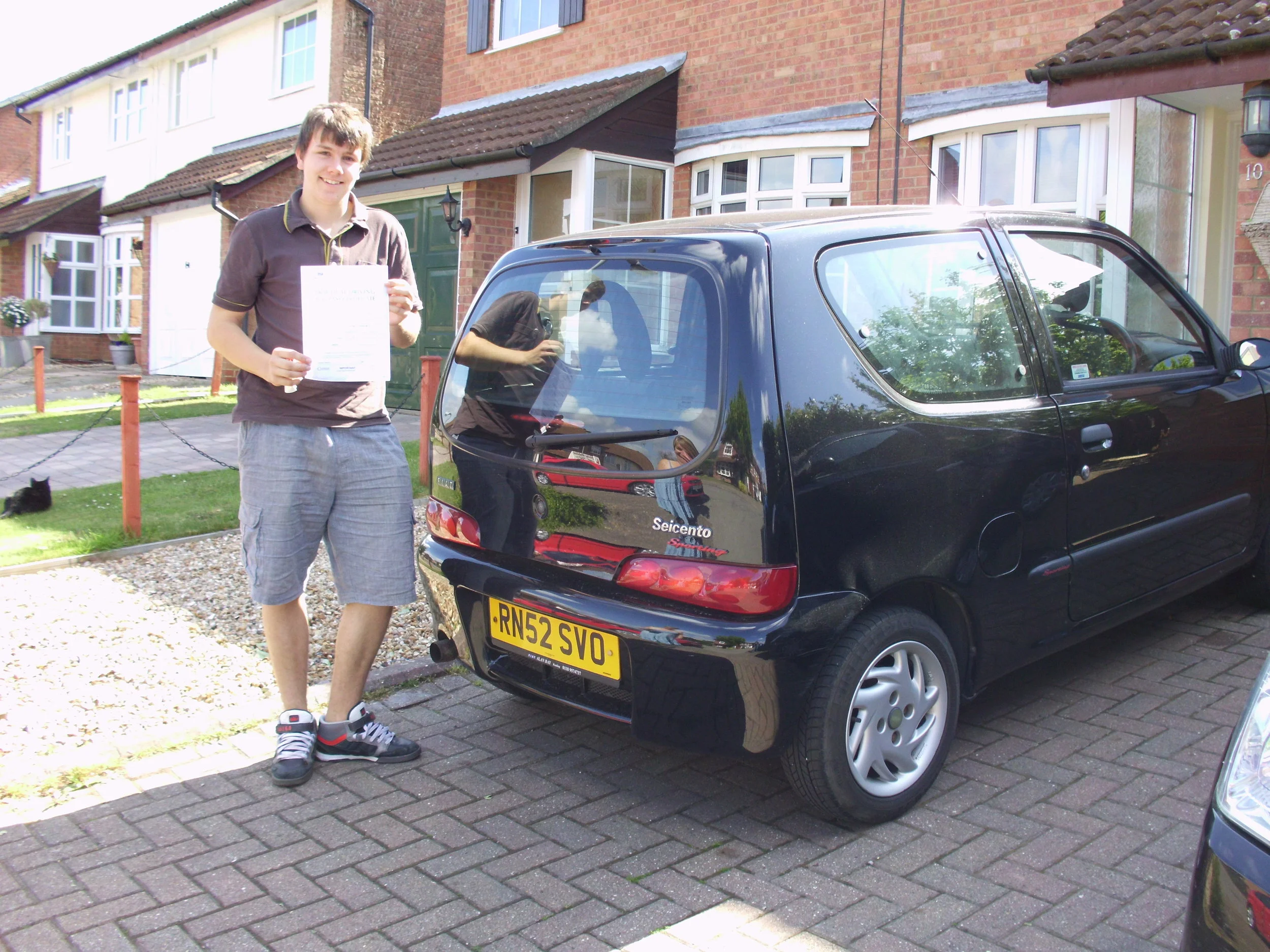 Chris Beasley by his car.jpg