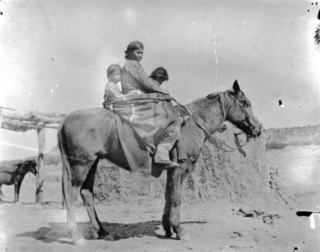 Woman and kids on horse-1890.jpg