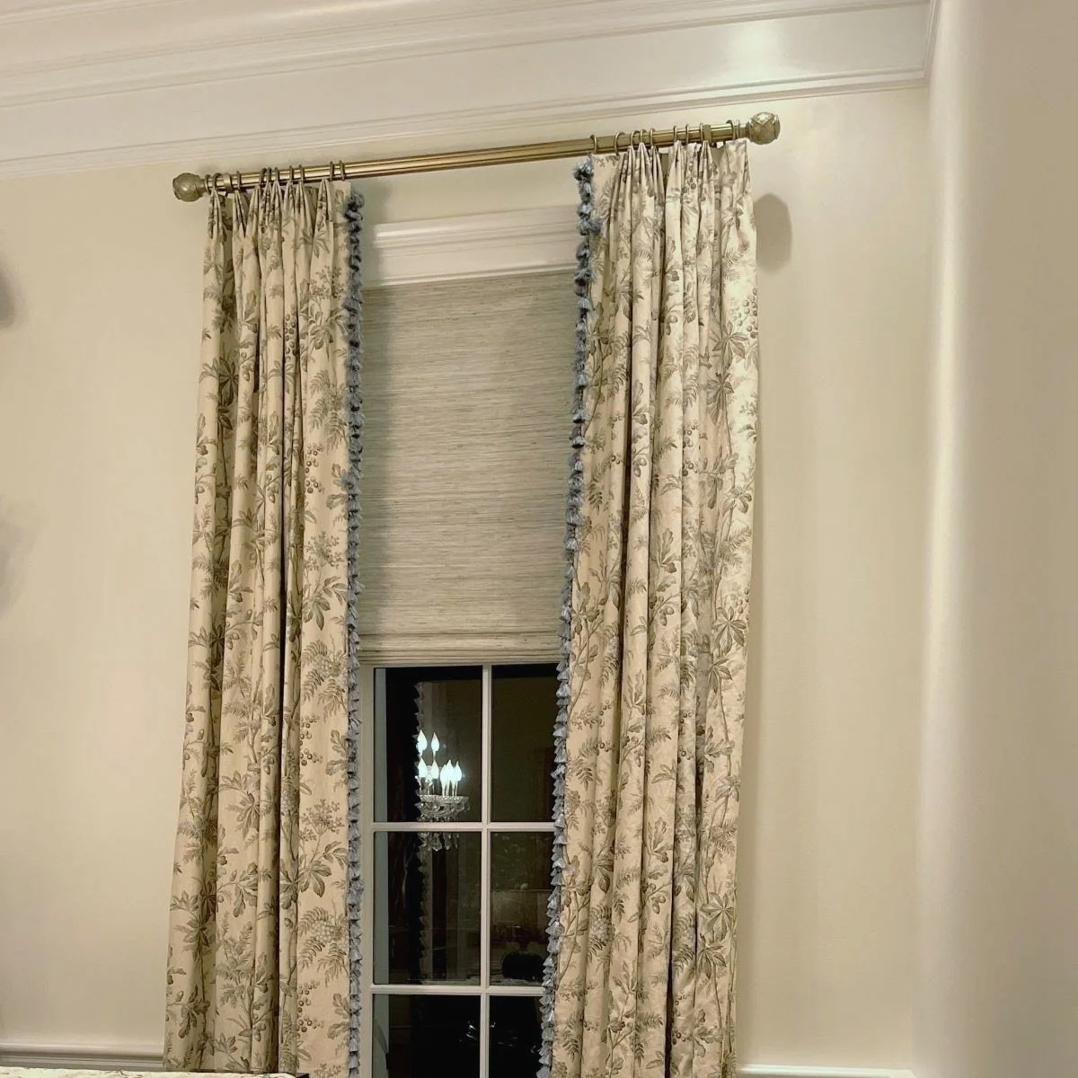 woven wood shade layered with drapery panels, installed by savannah window fashions