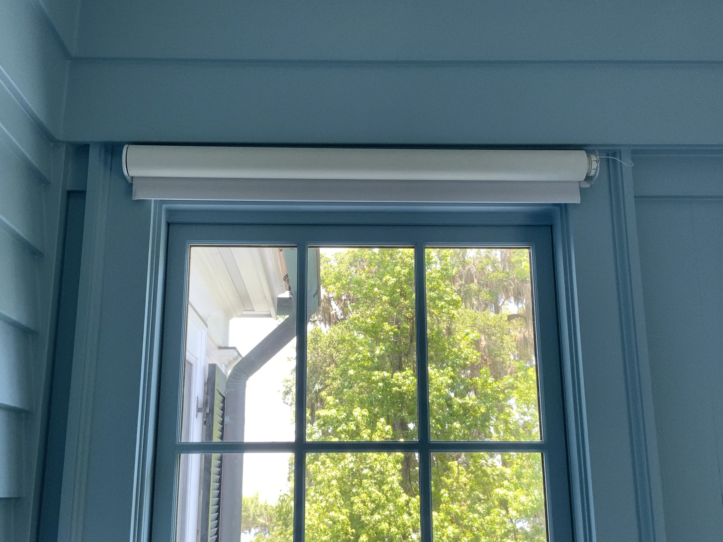  Motorized shades&nbsp; provide convenient control over lighting and privacy. 