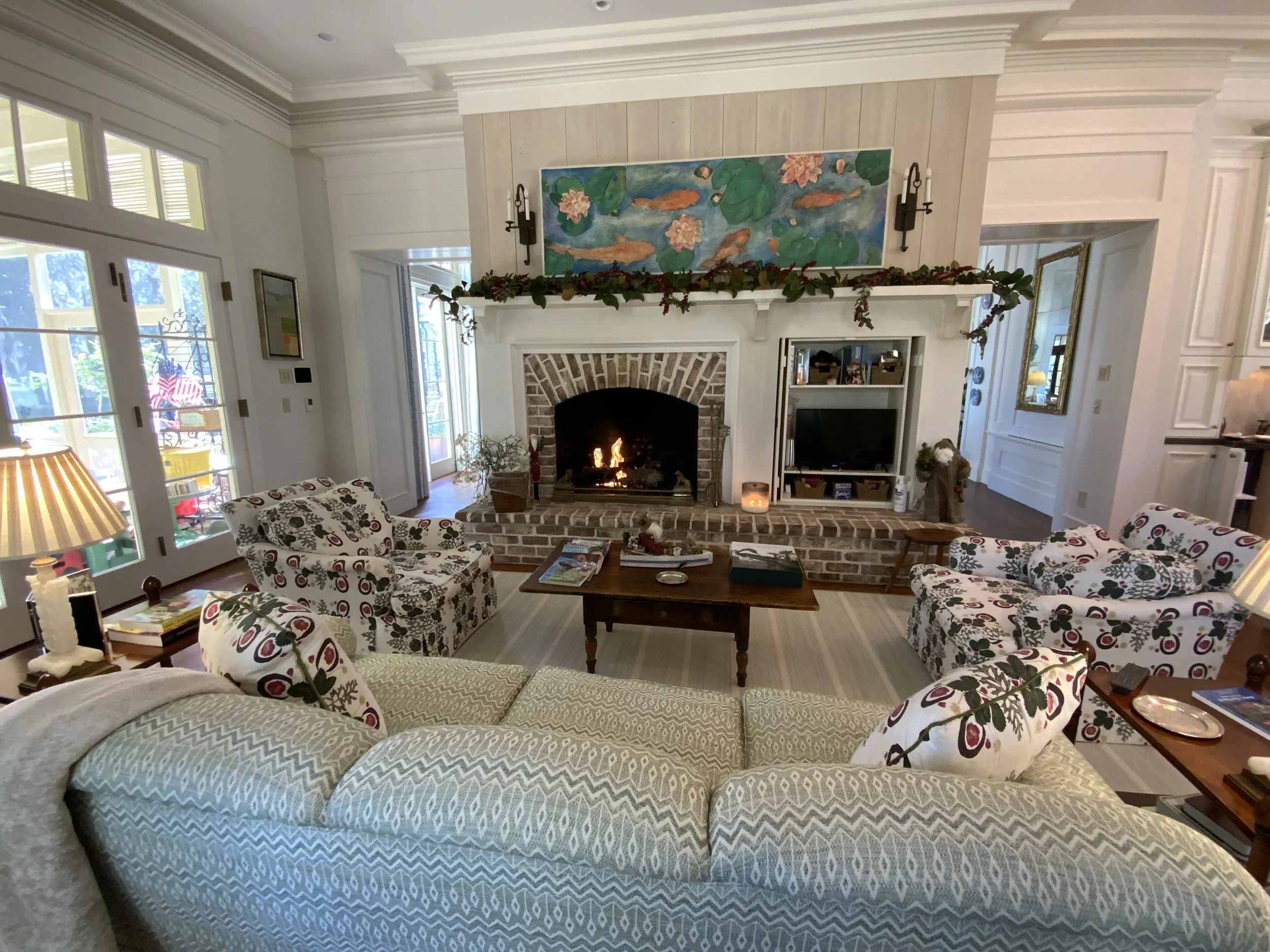 In this Keeping Room custom pillows coordinate with the vibrant furnishings.