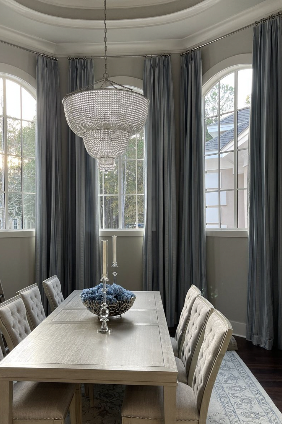 This dining room showcases how custom drapery can elevate a formal space.