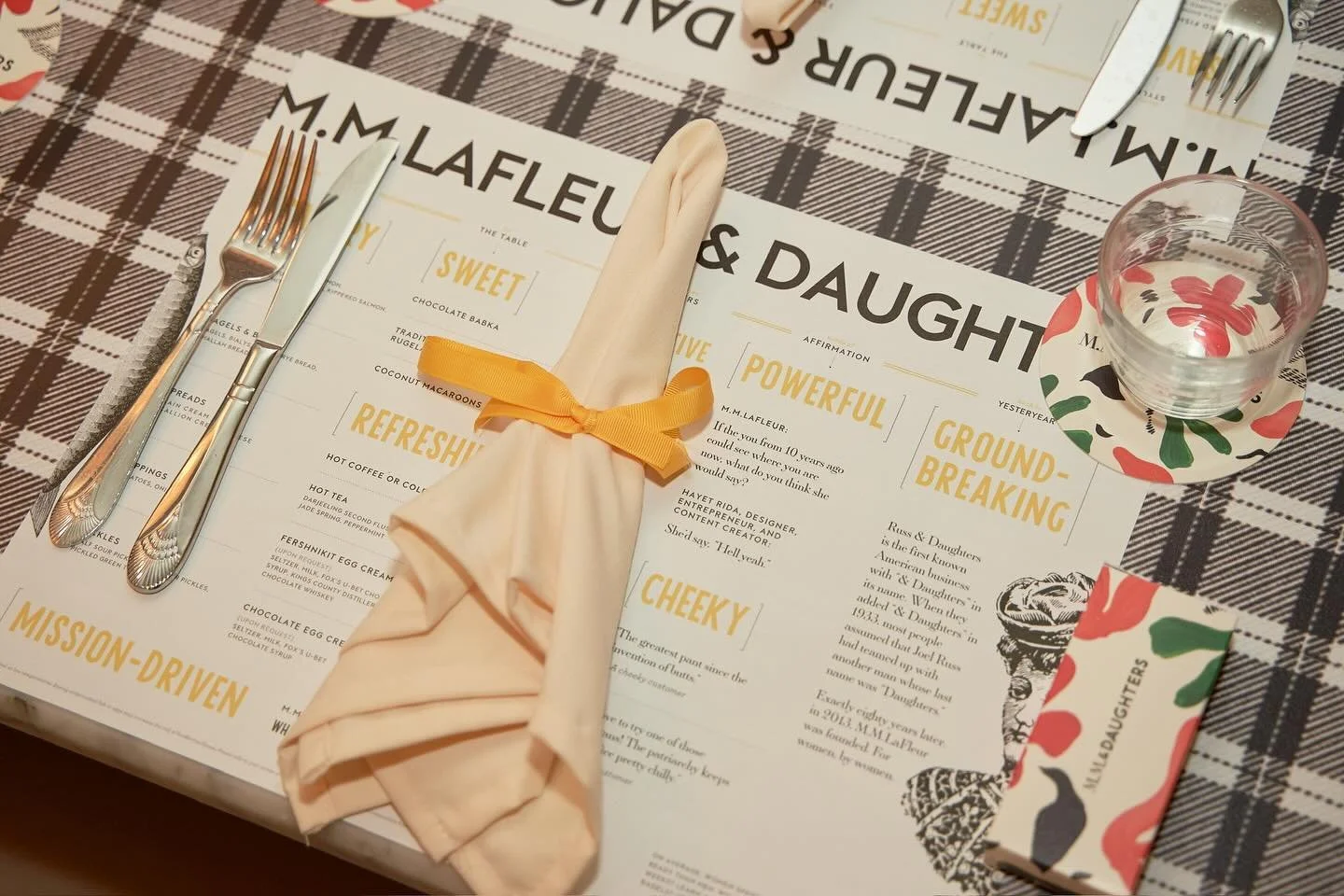 Still dreaming about this spread 🥯 Throwback to the M.M.LaFleur x Russ &amp; Daughters collab, where we transformed the space &mdash; from placemats to mirror decals and more, SPAR made delicatessen fashion-forward! #MadeBySPAR