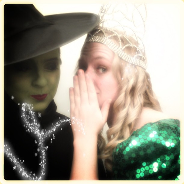 Darci is the woman in green in this photo. Not the woman in the green dress; the WOMAN IN GREEN.