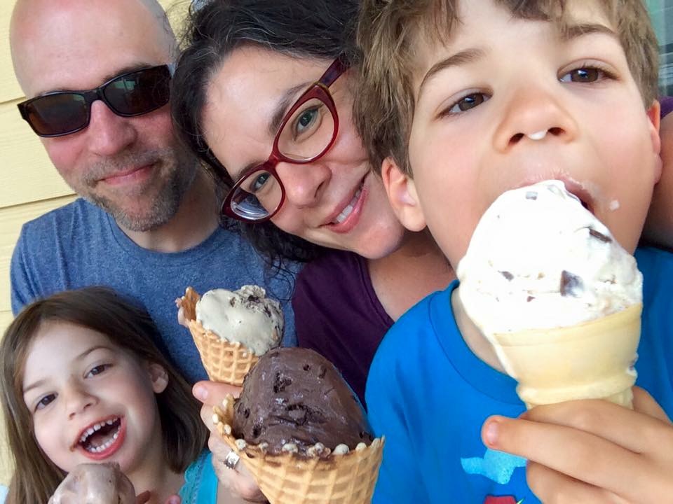 Four people cooler than the ice cream their holding. Also, messier than said ice cream.