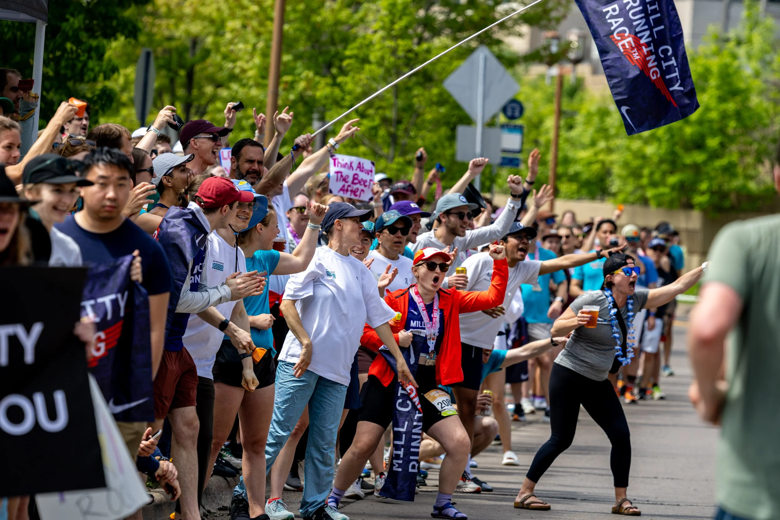 The Mill City Running Race Team cheering at Grandma's Marathon in Duluth