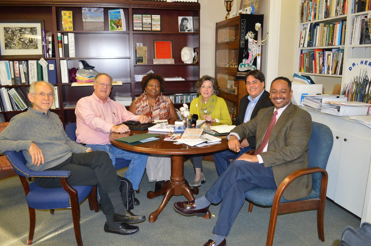 The Delta Center for Culture and Learning staff members Dr. Rolando Herts (right) and Lee Aylward (third from right) recently met with representatives from PathStone Puerto Rico Rural Innovation Fund and Mississippi Action for Community Education, Inc. of Greenville.