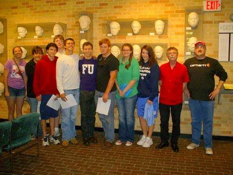  The St. Stephens Episcopal School Delta Heritage Class, in front of “A Cast of Blues,” the collection of life-masks of Blues musicians created by sculptor Sharon McConnell, outside the offices of the Delta Center in Ewing Hall. Group leader William Southerland is on the far right, next to Luther Brown of the DSU Delta Center. Photo by Lee Aylward.
