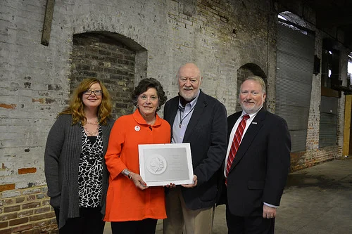 L to R: Heather Miller and Lee Aylward of the Delta Center, Dr. Henry Outlaw, formerly of the Delta Center, and Dr. Charles McAdams, Provost and Vice President for Academic Affairs at Delta State