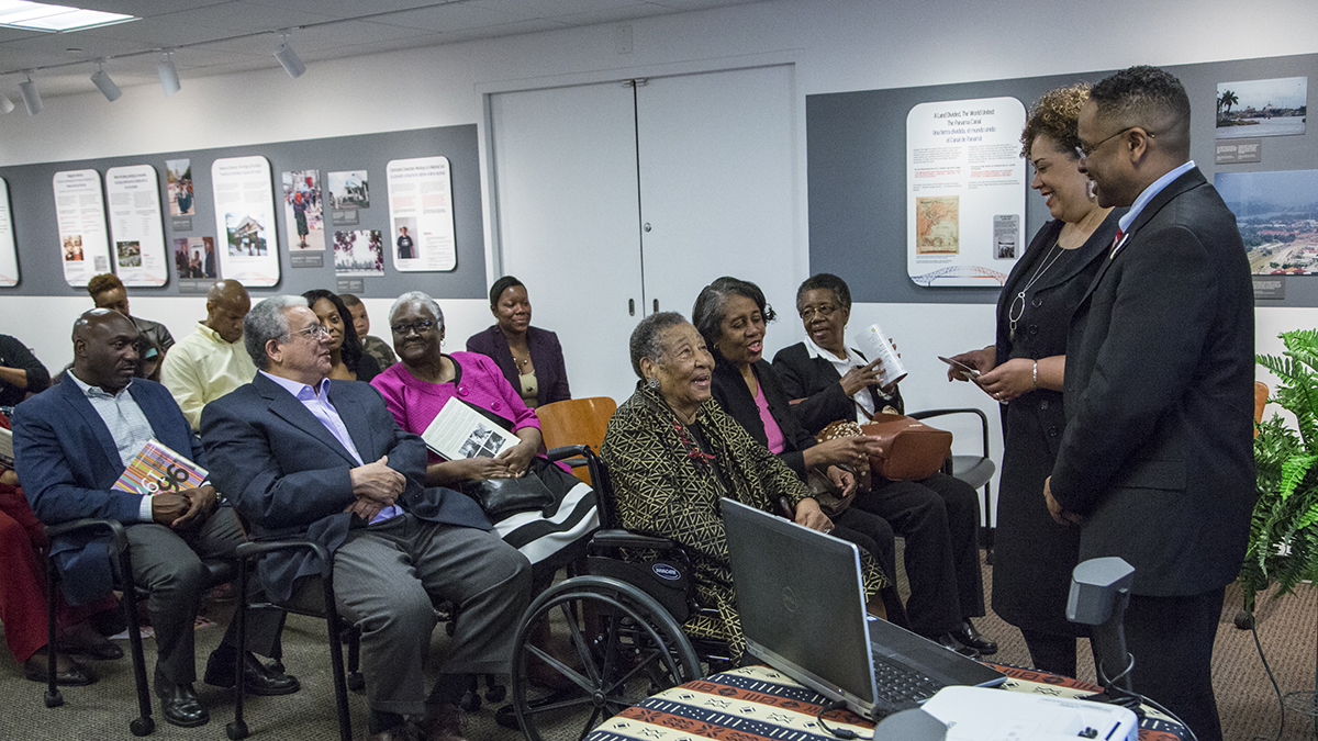  Alysia Burton Steele and Dr. Herts speak with Mrs. Campbell and guests before the Delta Jewels program begins at Smithsonian Anacostia Community Museum. (Photo courtesy of Smithsonian Institution)   