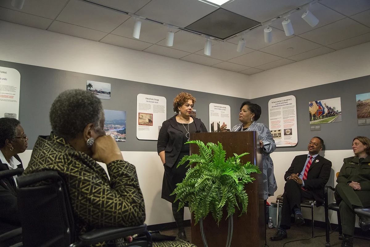 Reena Evers (right) speaks on behalf of her mother, Delta Jewel Myrlie Evers-Williams, commending Alysia Burton Steele for gathering and preserving untold stories of Mississippi Delta church mothers. (Photo courtesy of Smithsonian Institution)