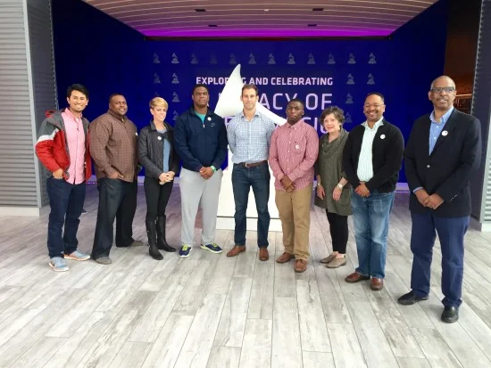 Delta Center staff members Dr. Rolando Herts and Lee Aylward at GRAMMY Museum Mississippi with Ross Barkley of Eley Barkley P.A. Engineering and Architecture (center), Jimmie Tucker of Self and Tucker Architects (far right), and the University of Memphis National Organization of Minority Architects Student Competition Team.