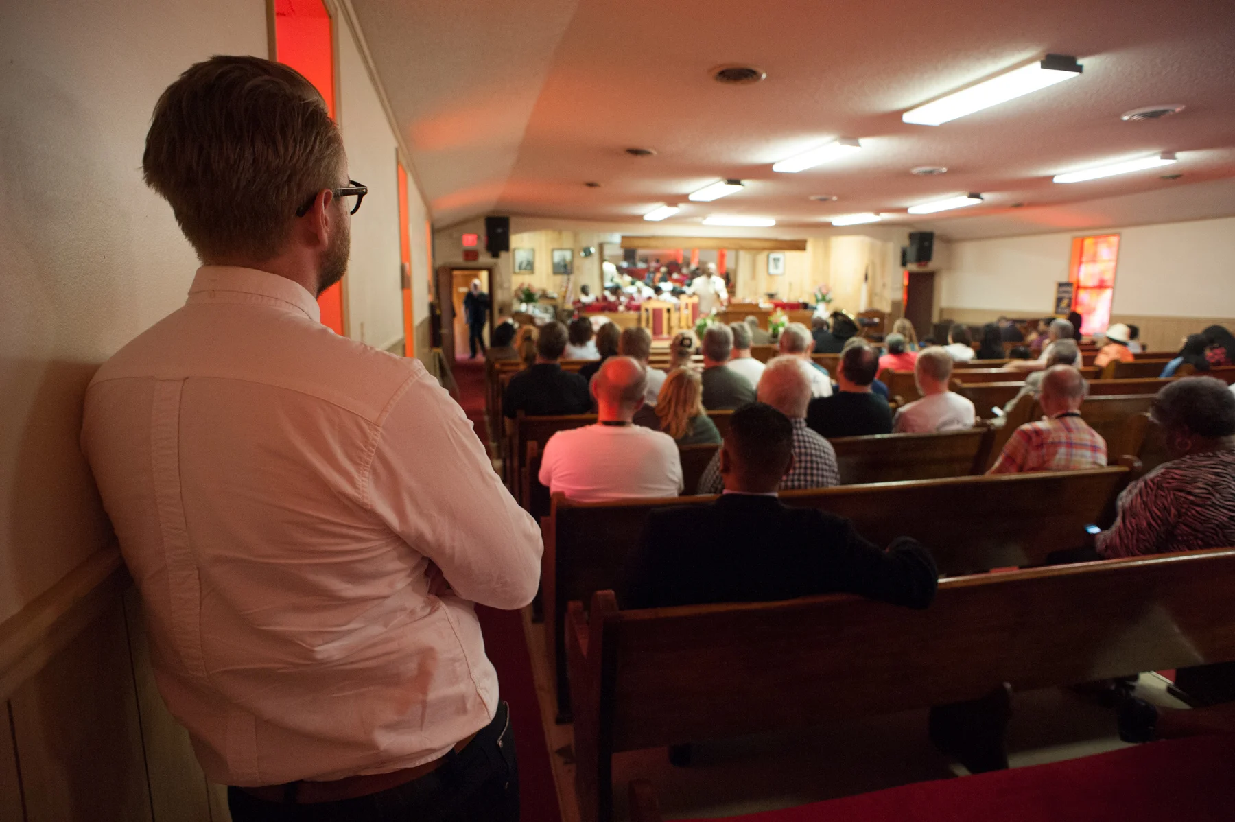 The group enjoys gospel music by the choir during church services at New Bethel Missionary Baptist Church in Clarksdale.