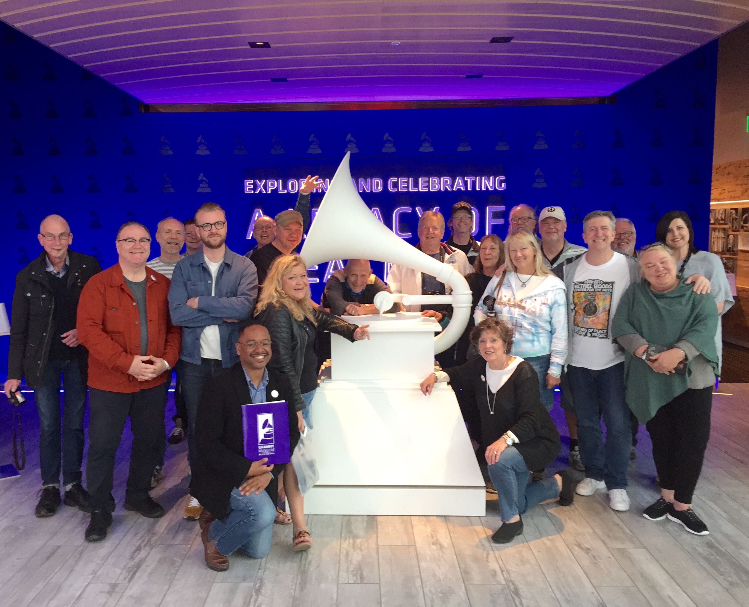  A giant replica of the GRAMMY award greets visitors at the entrance of the new museum in Cleveland, and the group of travelers from Sweden takes advantage of the iconic symbol for a group photo. Joining the tour are Dr. Rolando Herts (bottom left), 