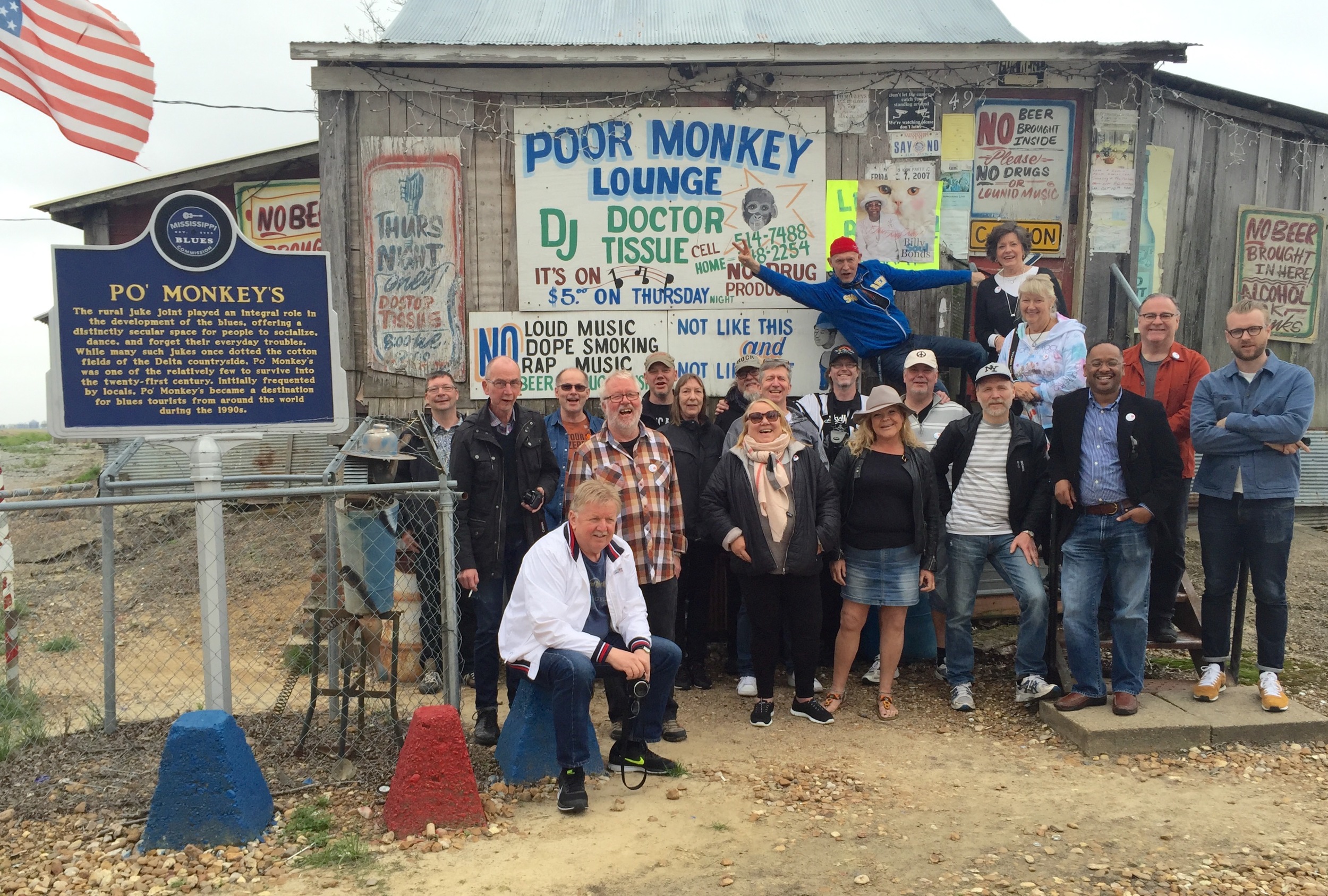  The group poses outside of Willie Seaberry's legendary juke joint, Po' Monkey's Lounge. 